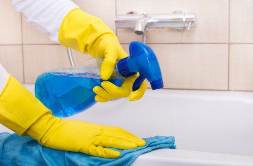 Deep upholstery cleaning service removing dirt from a living room sofa