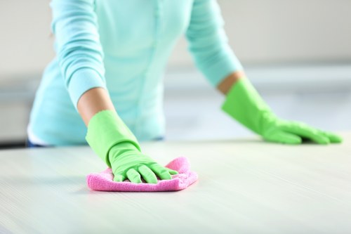 Technician using deep cleaning equipment on a carpet in Kensington