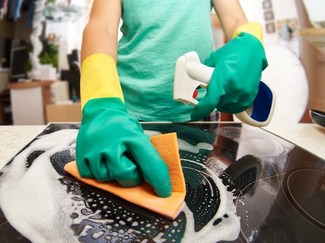 Professional upholstery and carpet cleaning service in progress
